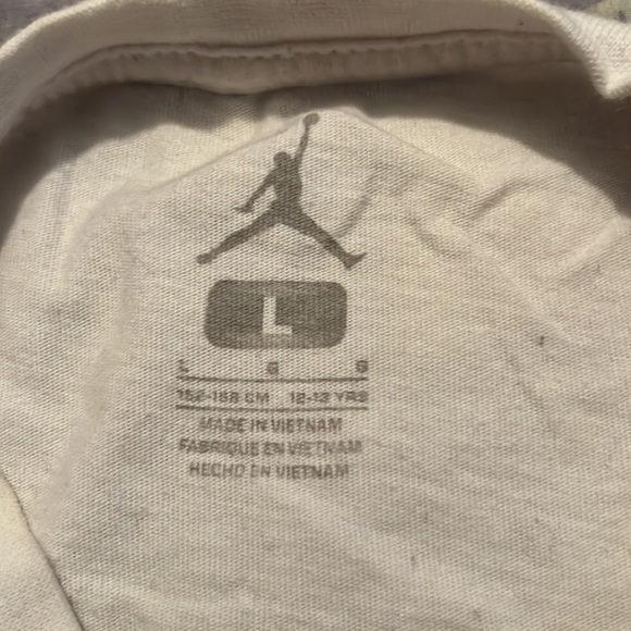 A Jordan t shirt. The size is a boys large. - Picture 2 of 2